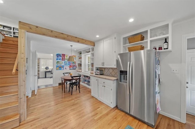 8315 Lee Blvd, Leawood, KS 66206 - kitchen with stainless steel fridge with ice dispenser, open shelves, recessed lighting, white cabinets, and beam ceiling