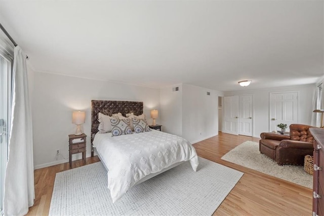 8315 Lee Blvd, Leawood, KS 66206 - bedroom featuring light wood-type flooring
