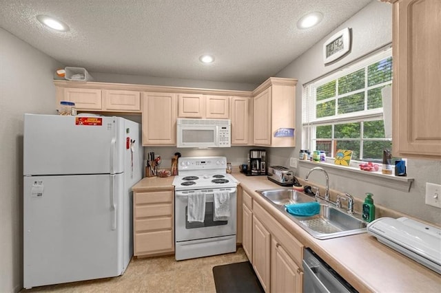 3568 NE Austin Dr, Lees Summit, MO 64064 - kitchen featuring white appliances, a textured ceiling, light countertops, light brown cabinetry, and recessed lighting