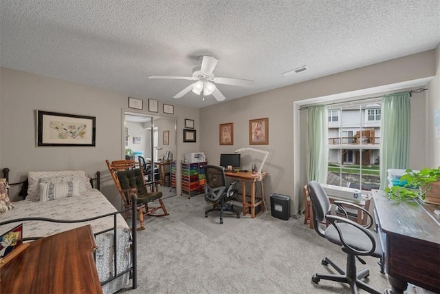 3568 NE Austin Dr, Lees Summit, MO 64064 - office area featuring ceiling fan, carpet flooring, and a textured ceiling
