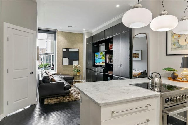 4545 Wornall Rd Unit Le4, Kansas City, MO 64111 - kitchen featuring stainless steel electric range, ornamental molding, light stone counters, dark cabinetry, and dark wood-style flooring