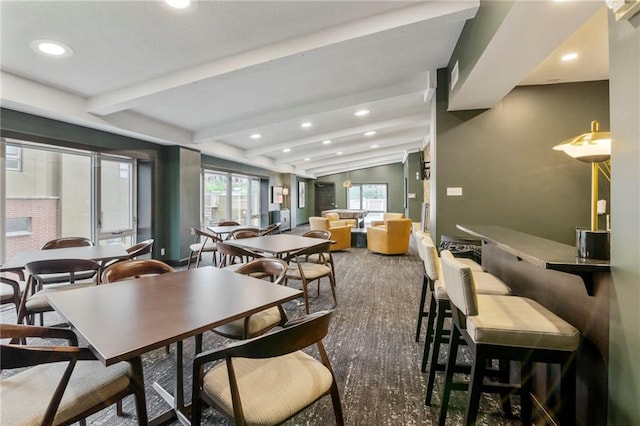 4545 Wornall Rd Unit Le4, Kansas City, MO 64111 - dining space featuring recessed lighting, beamed ceiling, and wood finished floors