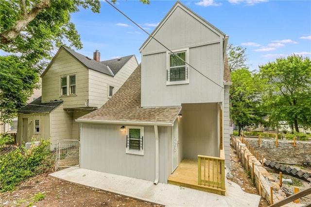 410 Kensington Ave, Kansas City, MO 64124 - rear view of house with roof with shingles