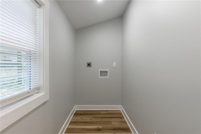 410 Kensington Ave, Kansas City, MO 64124 - laundry area featuring electric dryer hookup, washer hookup, and wood finished floors