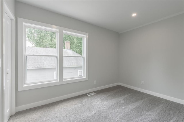 410 Kensington Ave, Kansas City, MO 64124 - spare room featuring carpet and recessed lighting