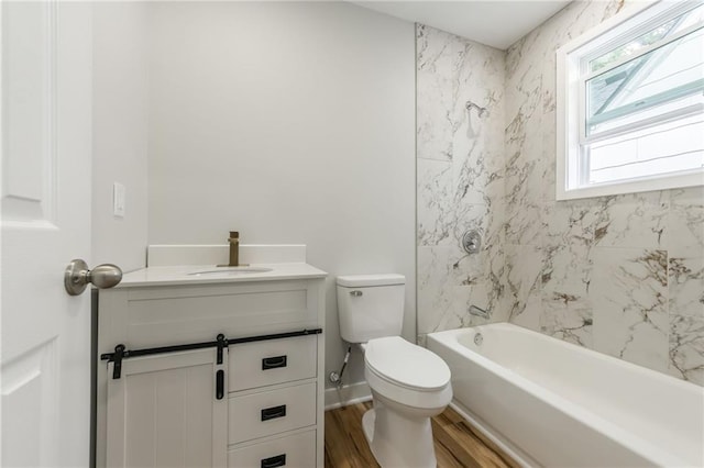 410 Kensington Ave, Kansas City, MO 64124 - bathroom with vanity, wood finished floors, and shower / tub combination