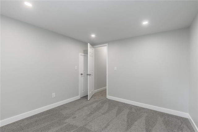 410 Kensington Ave, Kansas City, MO 64124 - carpeted spare room with recessed lighting and baseboards