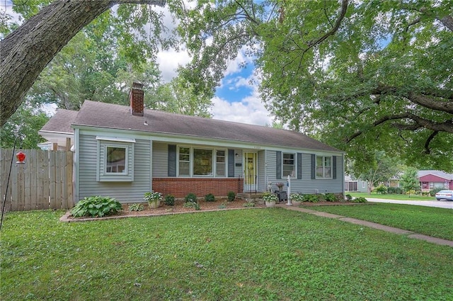 11325 W 54th St, Shawnee, KS 66203 - single story home with a chimney and brick siding