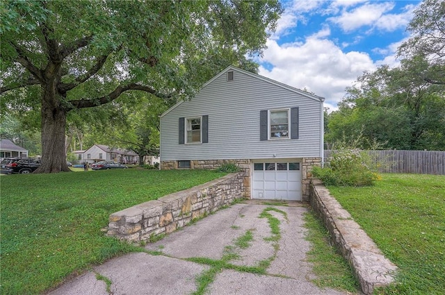 11325 W 54th St, Shawnee, KS 66203 - view of side of home with driveway and a garage