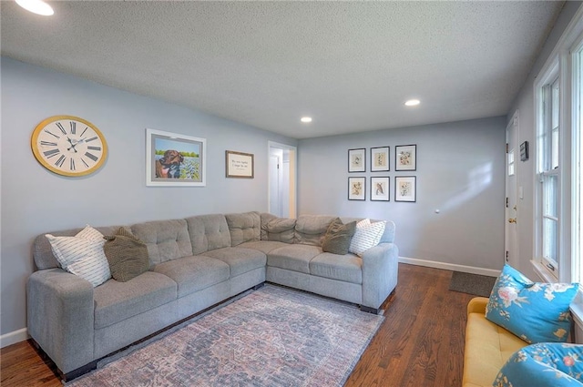 11325 W 54th St, Shawnee, KS 66203 - living room with dark wood-type flooring, a textured ceiling, and recessed lighting