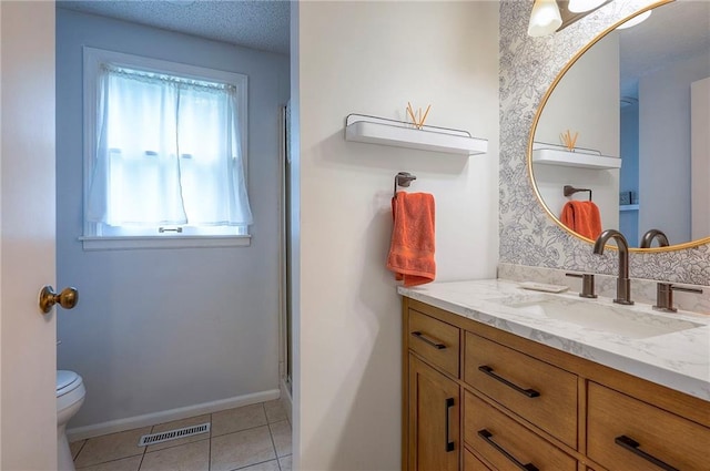 11325 W 54th St, Shawnee, KS 66203 - bathroom featuring vanity, tile patterned floors, and a shower with shower door