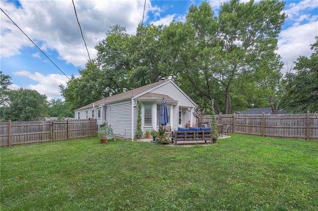 11325 W 54th St, Shawnee, KS 66203 - rear view of house with a fenced backyard and a patio area