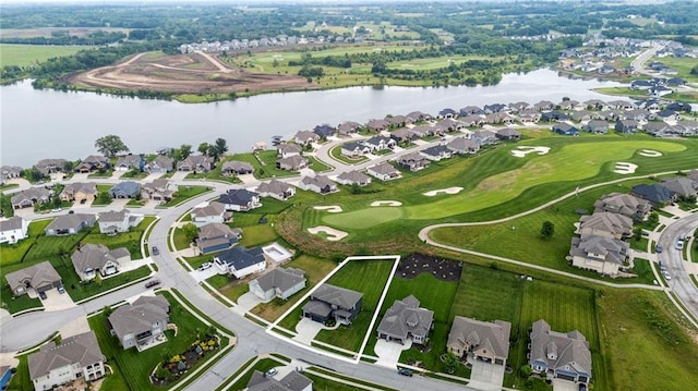 1005 Bridgeshire Dr, Raymore, MO 64083 - aerial view of property's location featuring nearby suburban area, a large body of water, and property parcel outlined
