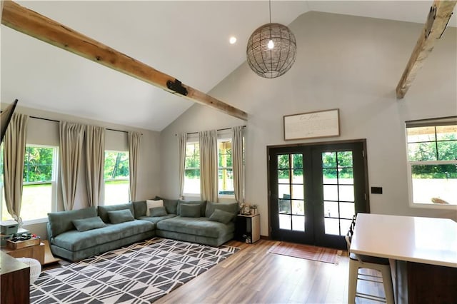 501 NW 101st Rd, Warrensburg, MO 64093 - living room featuring wood finished floors, french doors, high vaulted ceiling, and beamed ceiling