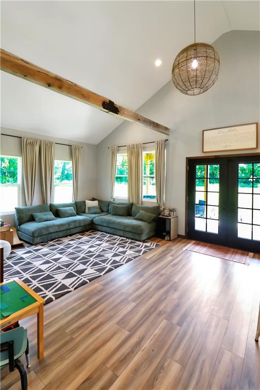 501 NW 101st Rd, Warrensburg, MO 64093 - living room featuring wood finished floors and french doors