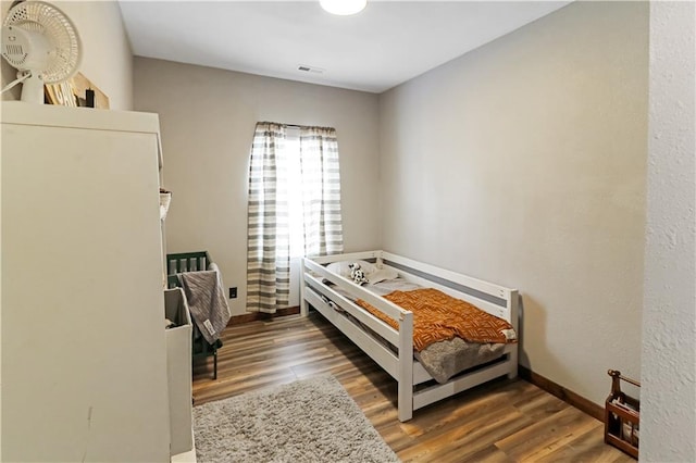 501 NW 101st Rd, Warrensburg, MO 64093 - bedroom with wood finished floors