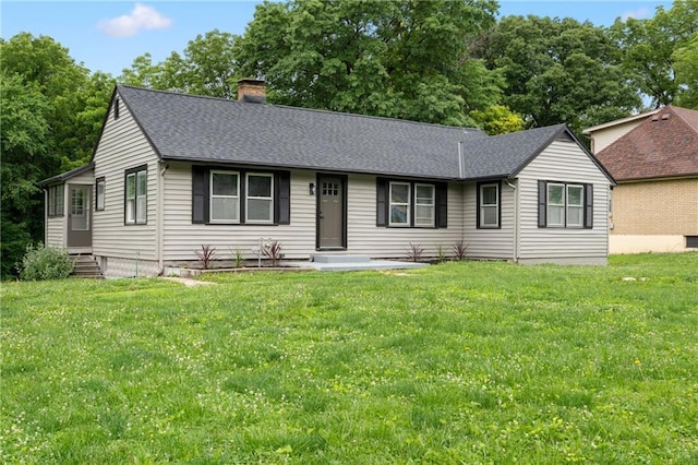 6806 N Brookside Rd, Pleasant Valley, MO 64068 - view of front of property featuring a chimney, entry steps, a front lawn, and roof with shingles