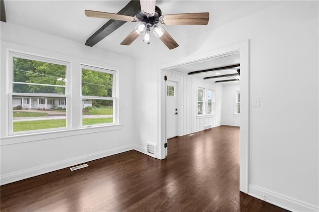 6806 N Brookside Rd, Pleasant Valley, MO 64068 - unfurnished room featuring a ceiling fan and dark wood-type flooring