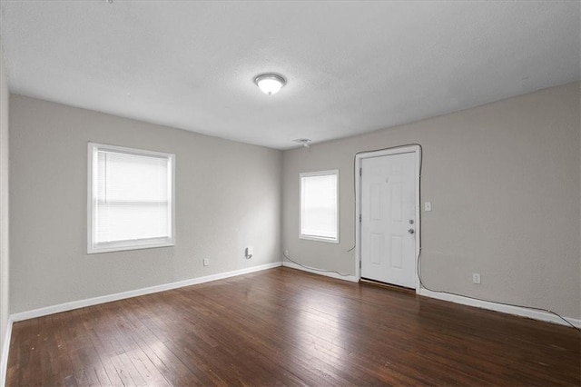 1646 Bennington Ave, Kansas City, MO 64126 - spare room with hardwood / wood-style floors and baseboards