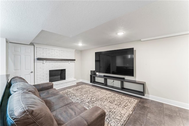 3005 Elmira Ct, Independence, MO 64057 - living room featuring a textured ceiling, a fireplace, and recessed lighting
