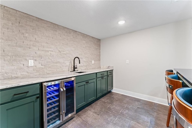 3005 Elmira Ct, Independence, MO 64057 - indoor wet bar featuring beverage cooler and tasteful backsplash