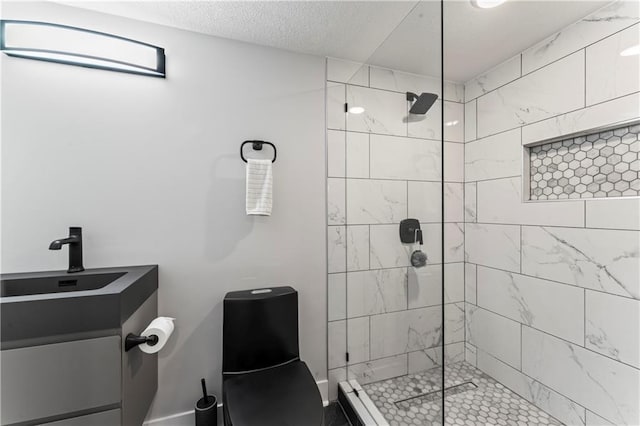 3005 Elmira Ct, Independence, MO 64057 - full bathroom with tiled shower, vanity, and a textured ceiling