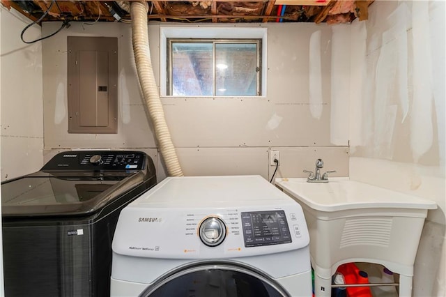 3005 Elmira Ct, Independence, MO 64057 - laundry room featuring electric panel and independent washer and dryer