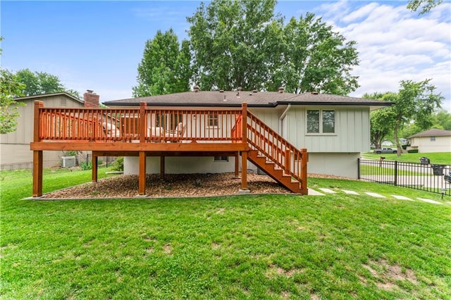 3005 Elmira Ct, Independence, MO 64057 - back of property featuring a deck, board and batten siding, and stairs