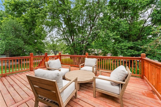 3005 Elmira Ct, Independence, MO 64057 - wooden terrace with outdoor lounge area