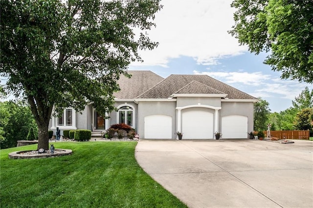 3401 NE 153rd Ter, Smithville, MO 64089 - view of front of house with a garage, stucco siding, driveway, and a shingled roof