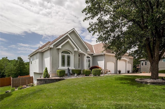 3401 NE 153rd Ter, Smithville, MO 64089 - single story home with stucco siding, an attached garage, and driveway