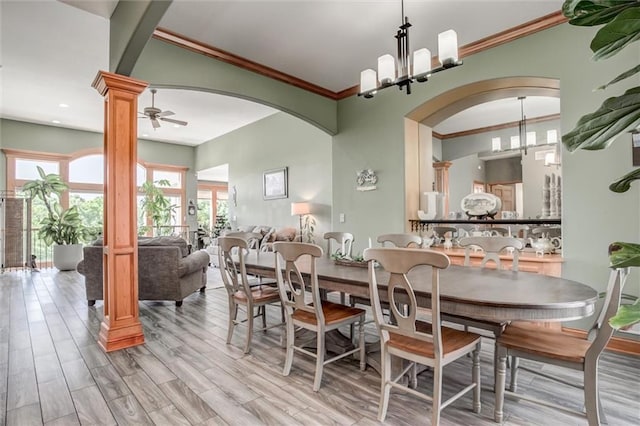 3401 NE 153rd Ter, Smithville, MO 64089 - dining space with a chandelier, arched walkways, light wood-style floors, a ceiling fan, and recessed lighting