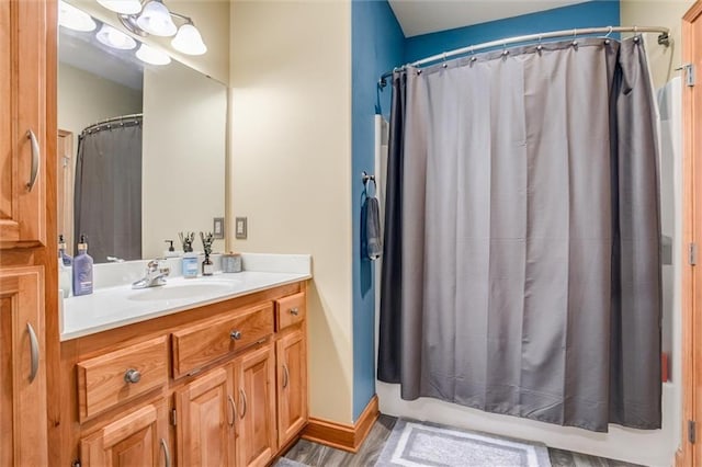 3401 NE 153rd Ter, Smithville, MO 64089 - bathroom with vanity, shower / tub combo with curtain, and wood finished floors