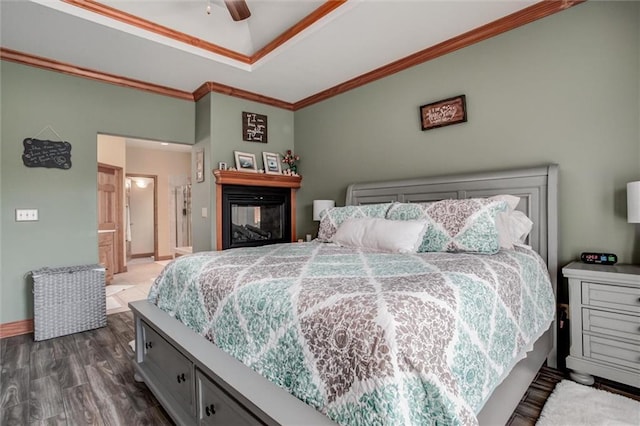 3401 NE 153rd Ter, Smithville, MO 64089 - bedroom featuring crown molding, wood finished floors, a ceiling fan, and a raised ceiling