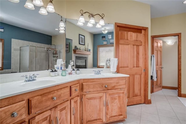 3401 NE 153rd Ter, Smithville, MO 64089 - bathroom with tile patterned floors, a shower stall, double vanity, and a fireplace