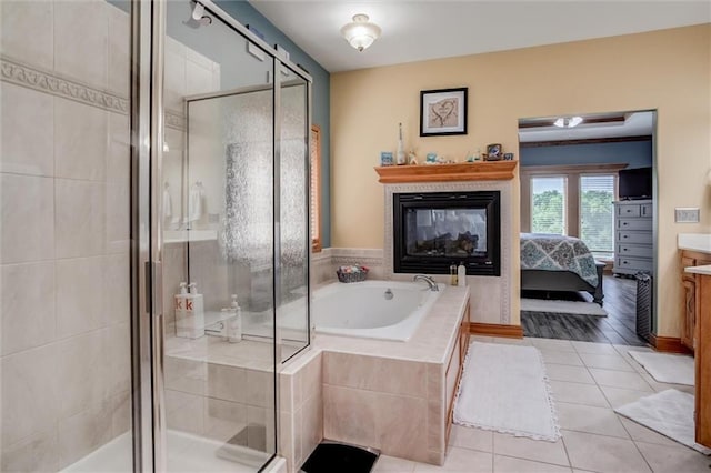 3401 NE 153rd Ter, Smithville, MO 64089 - full bath with a bath, tile patterned flooring, a stall shower, ensuite bathroom, and vanity