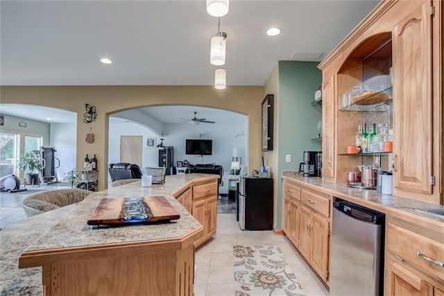 3401 NE 153rd Ter, Smithville, MO 64089 - kitchen with dishwashing machine, open floor plan, arched walkways, ceiling fan, and light countertops