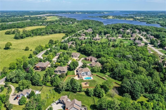 3401 NE 153rd Ter, Smithville, MO 64089 - aerial view of property and surrounding area with a large body of water and nearby suburban area