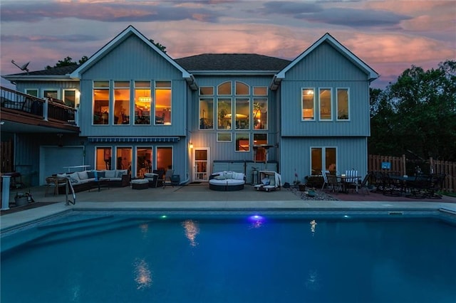 3401 NE 153rd Ter, Smithville, MO 64089 - rear view of property featuring outdoor lounge area, an outdoor pool, a patio area, and a balcony