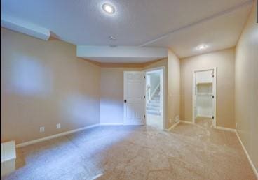 9307 W 146th St, Overland Park, KS 66221 - empty room with carpet floors, recessed lighting, and stairs