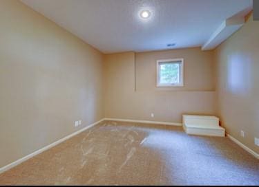 9307 W 146th St, Overland Park, KS 66221 - carpeted spare room featuring baseboards and recessed lighting