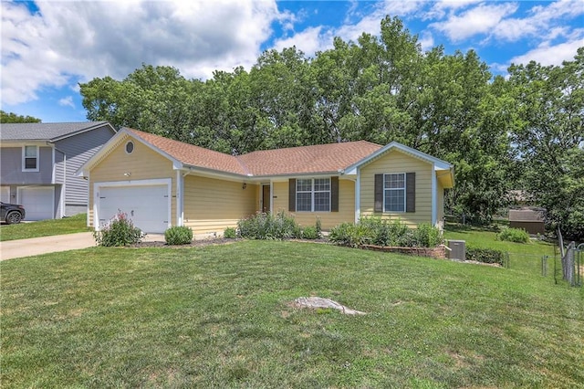1705 N Jones Ct, Independence, MO 64056 - view of front of house with a garage and driveway