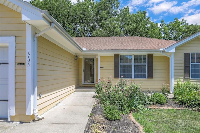1705 N Jones Ct, Independence, MO 64056 - property entrance with a shingled roof