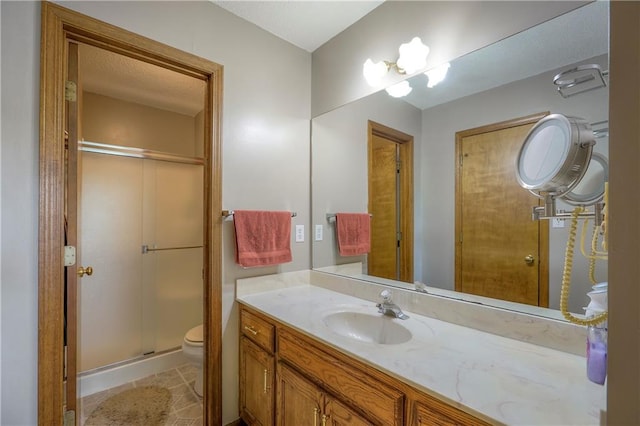 1705 N Jones Ct, Independence, MO 64056 - full bathroom with a shower stall, vanity, and tile patterned flooring