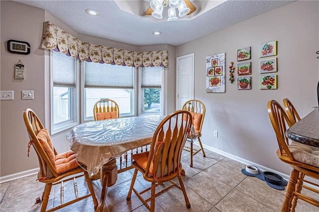5118 SW Pelican Pt, Lees Summit, MO 64082 - tiled dining space featuring a textured ceiling, a ceiling fan, and recessed lighting