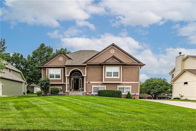 5118 SW Pelican Pt, Lees Summit, MO 64082 - raised ranch with a front lawn and stucco siding