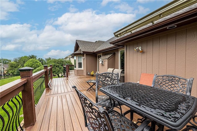 5118 SW Pelican Pt, Lees Summit, MO 64082 - wooden deck with outdoor dining area