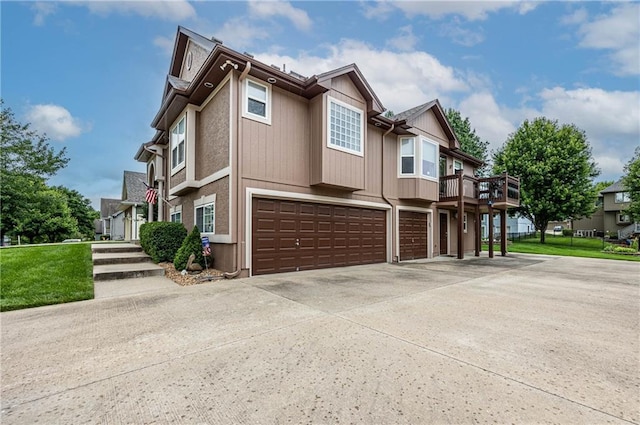 5118 SW Pelican Pt, Lees Summit, MO 64082 - view of front of property with an attached garage, driveway, and a residential view