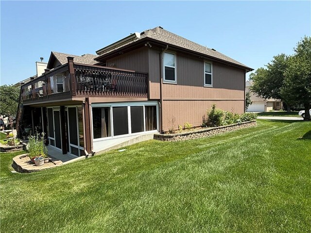 5118 SW Pelican Pt, Lees Summit, MO 64082 - rear view of property featuring a lawn and a chimney