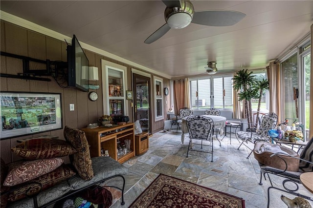 5118 SW Pelican Pt, Lees Summit, MO 64082 - sunroom / solarium with stone finish flooring and plenty of natural light